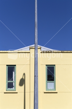 Yellow building and street light
