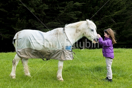 Kiwi girl with her pony bimbo.