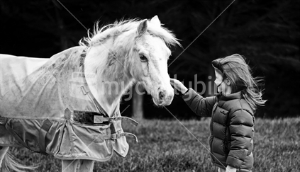 Kiwi girl with pony