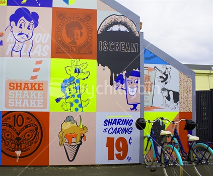 Bikes outside a Kiwiana wall mural in Martinborough