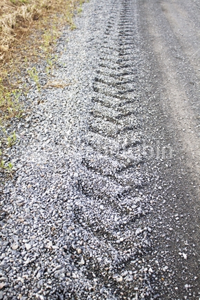 Tyre tread on a gravel road
