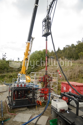 Well engineers pump concrete into an 850m deep oil well to seal off seepage from the oil bearing strata. 