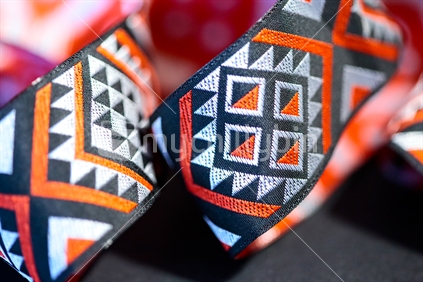 Ribbon with pattern informed by Maori culture.