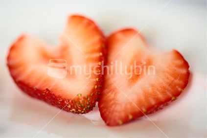 Two slices of a strawberry - very limited depth of field.