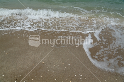A broken wave on the sand.  Taken on Eastern beach.