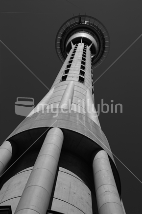 Looking up at the Auckland sky tower on a clear blue sky day.