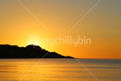 Raglan beach at sunset
