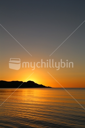 Raglan beach at sunset