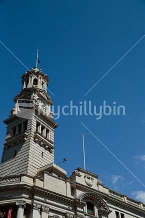 The clock tower of the auckland town hall with the sky.  Taken at Auckland city.